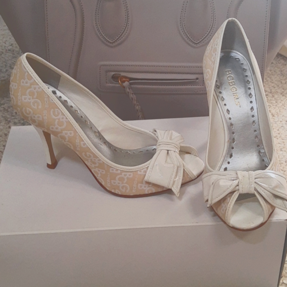 White and cream logo peep toe heels